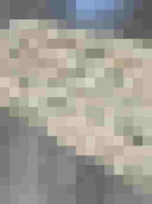 beige Baumwollschürze mit grünem und braunem Blättermuster